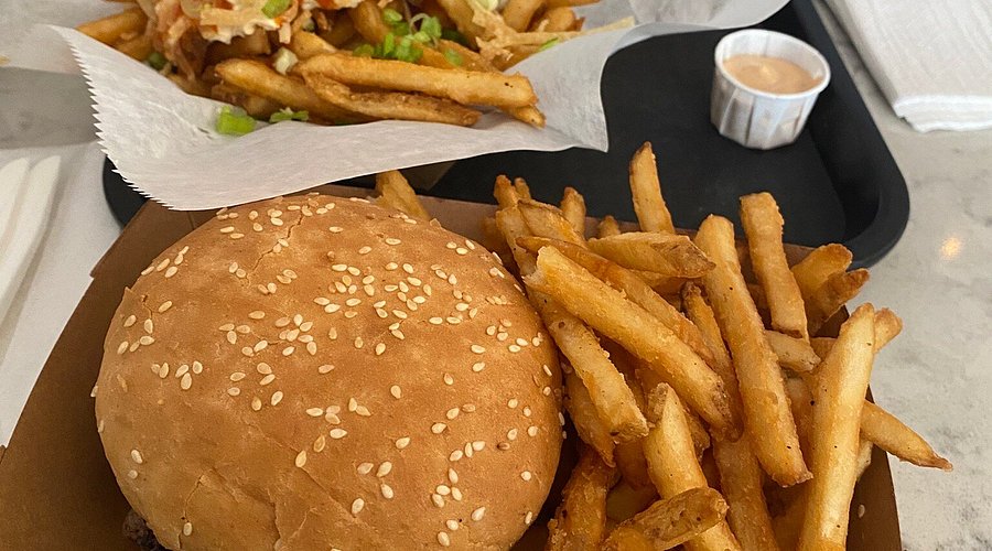 Block 16 signature dishes Croque Garcon Burger, Poutine Burrito, Duck Duck Goose Fries, Gangsta Fries